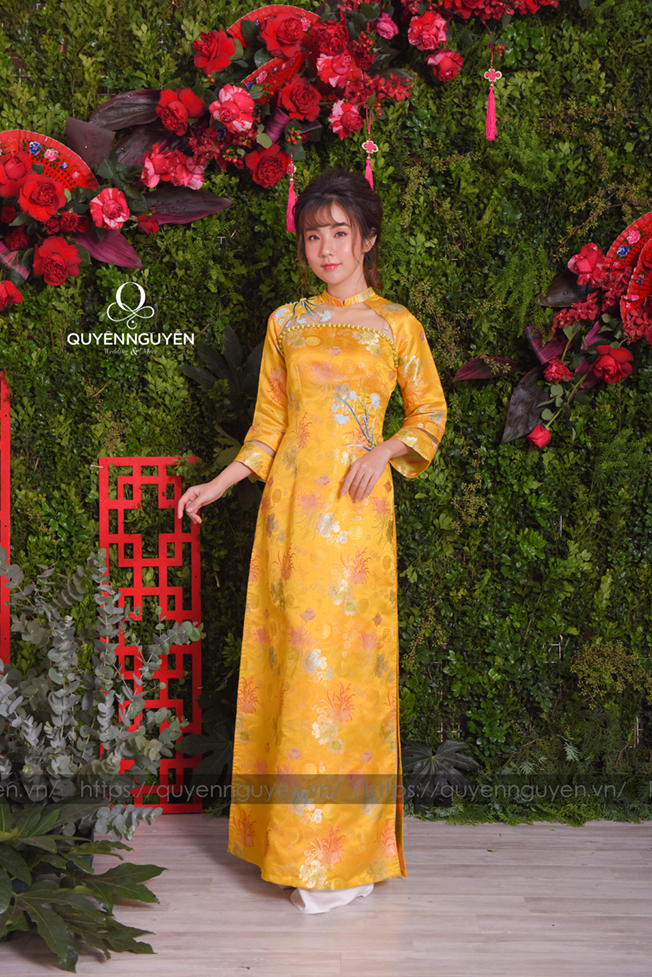 Áo dài cách tân gấm vàng họa tiết bông cỏ lau