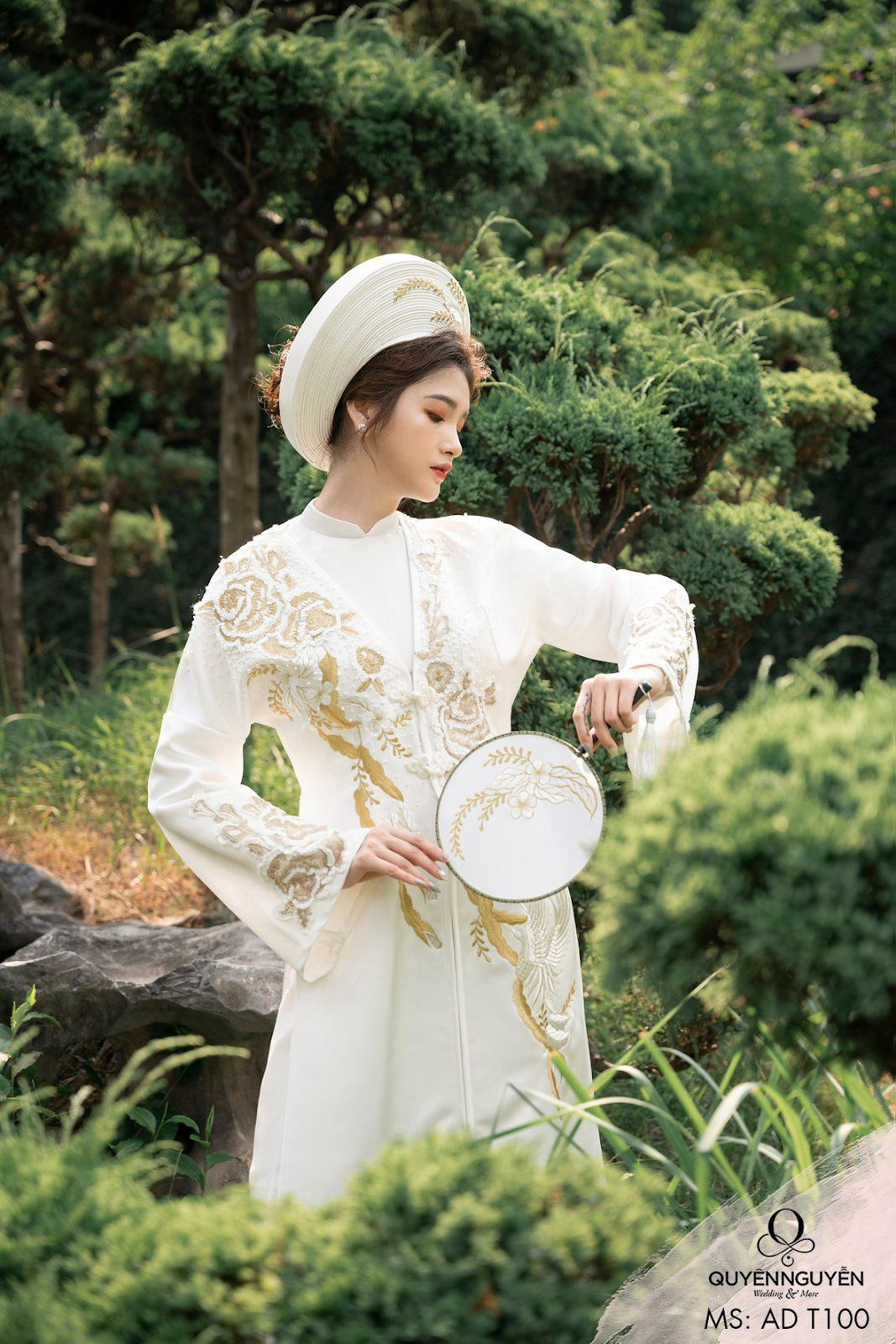 Áo dài cưới sắc trắng thêu chỉ lụa vàng đồng